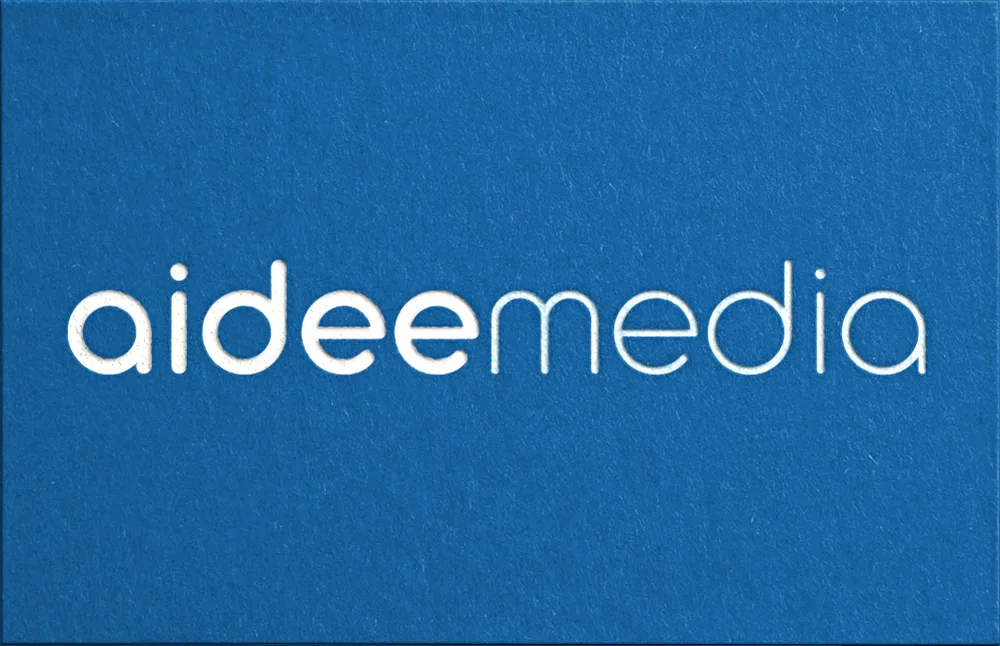aideemedia logo on business card
